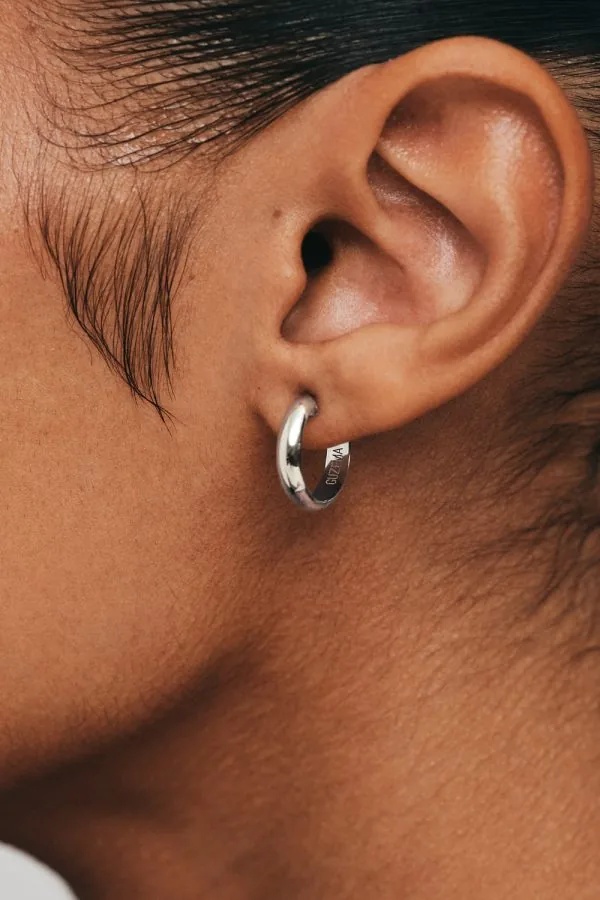 Earrings Bold Hug Hoops, white gold with timeless design by Guzema