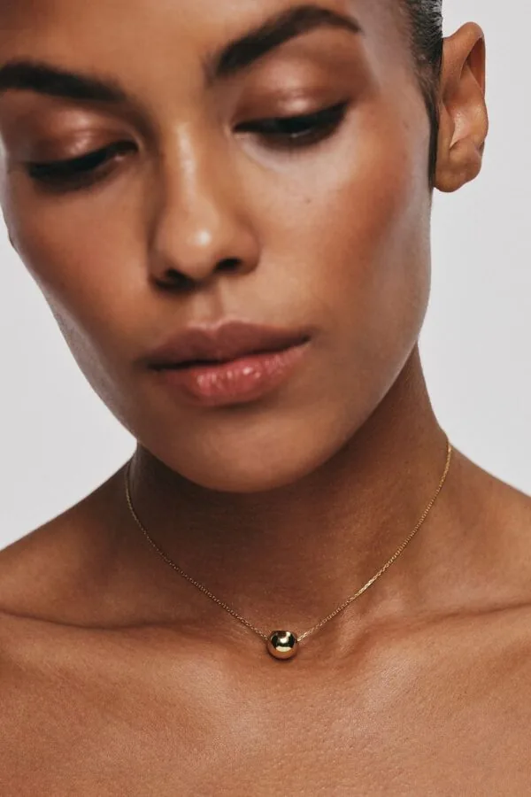 Exclusive Necklaces Semi-Orb Necklace, yellow gold from Guzema