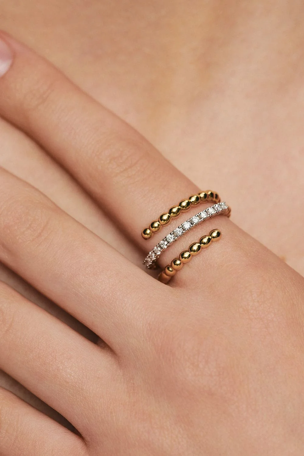 Rings Spiral Ring, diamonds, yellow gold available online with expert craftsmanship