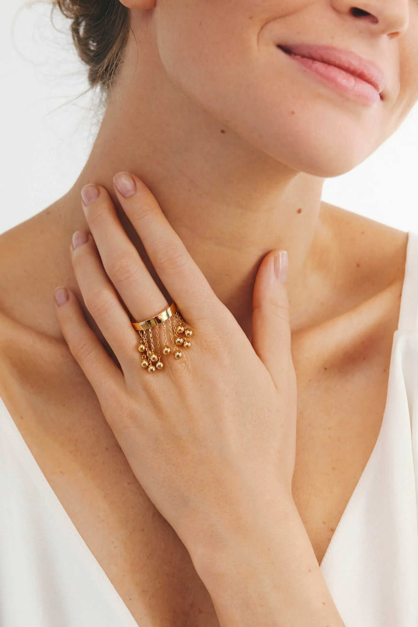 Rings Orbs Chainfall Ring, yellow gold available online with expert craftsmanship