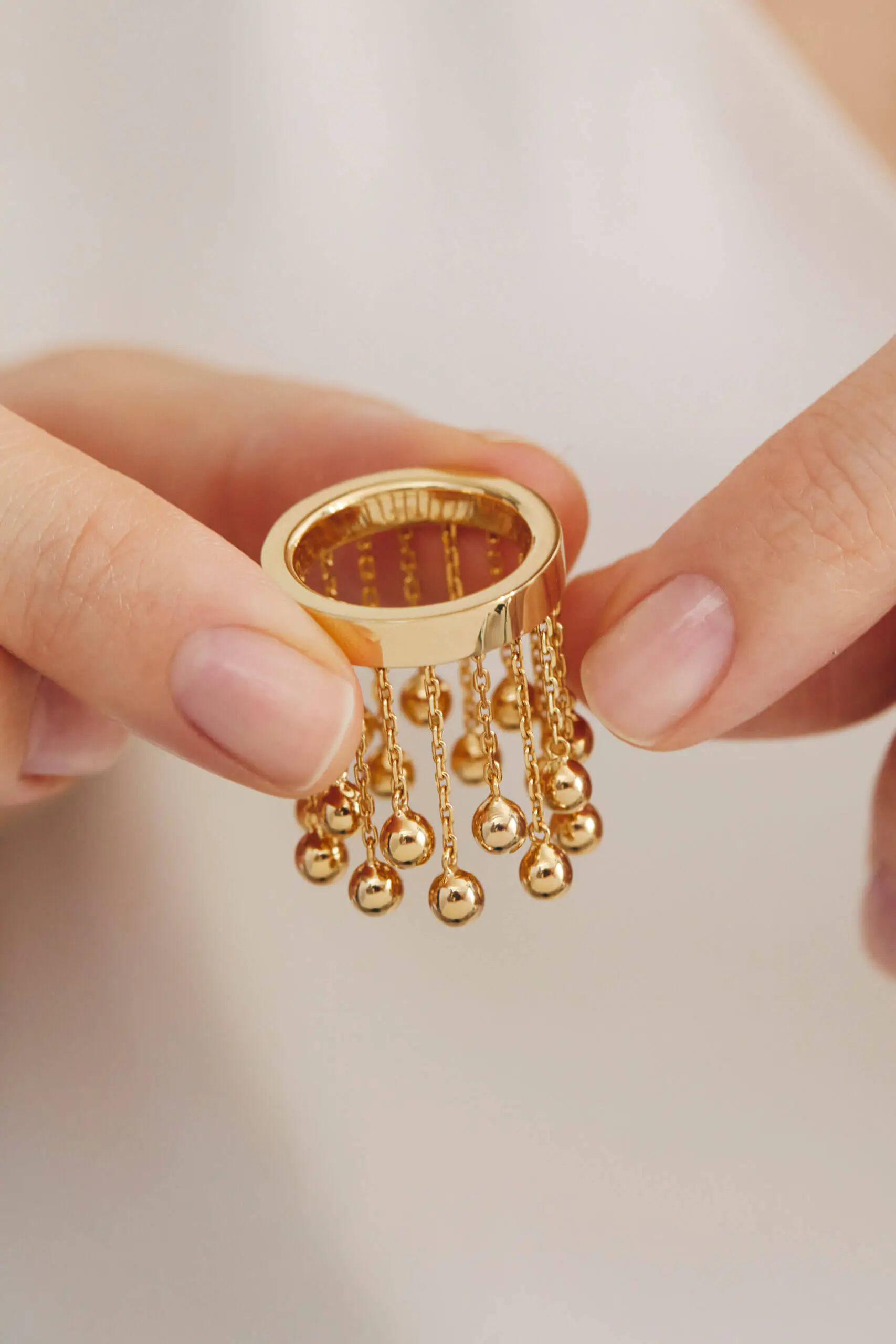 Rings Orbs Chainfall Ring, yellow gold available online with expert craftsmanship