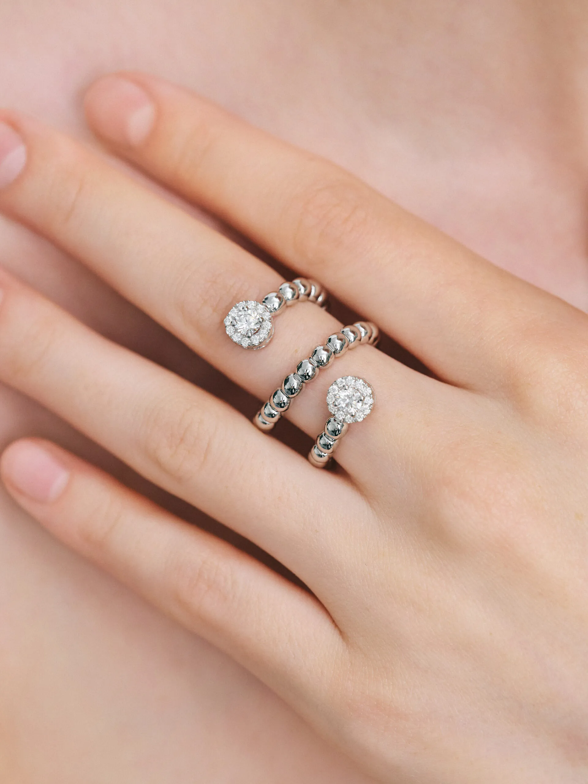 Rings Halo Spiral Ring, white gold with luxury craftsmanship from Guzema