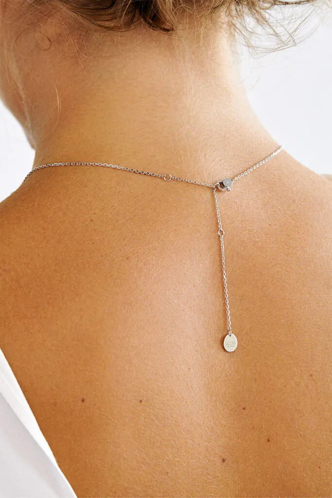 Exclusive Necklaces Petit Cross, white gold from Guzema