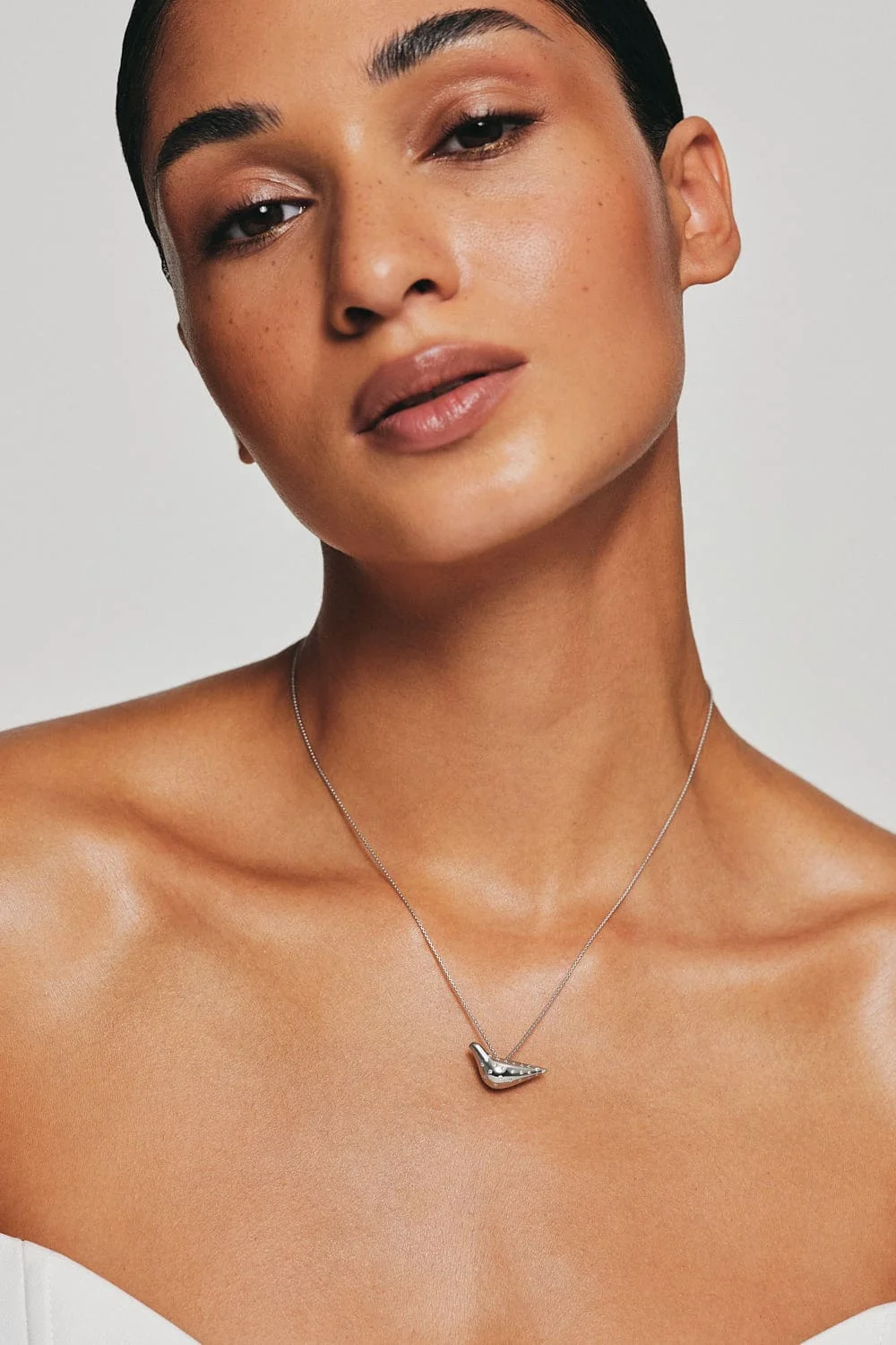 Necklaces Bird Girl Pendant with Diamonds, white gold with fast delivery from Guzema