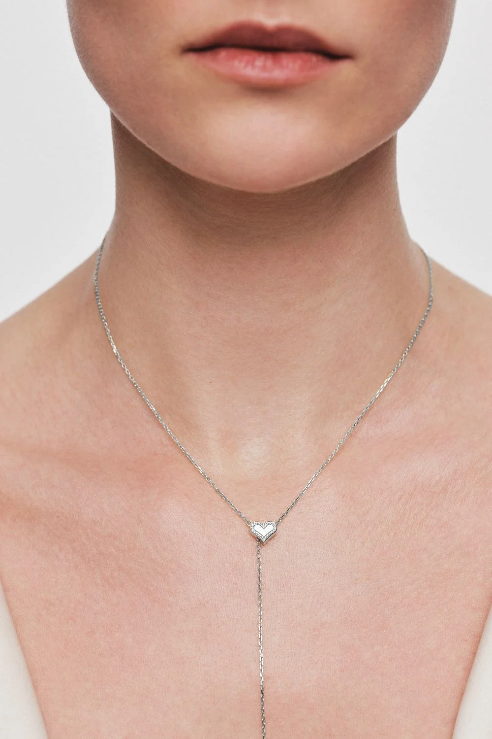 Necklaces Heart Transformer Necklace with Diamond Outline, white gold with fast delivery from Guzema