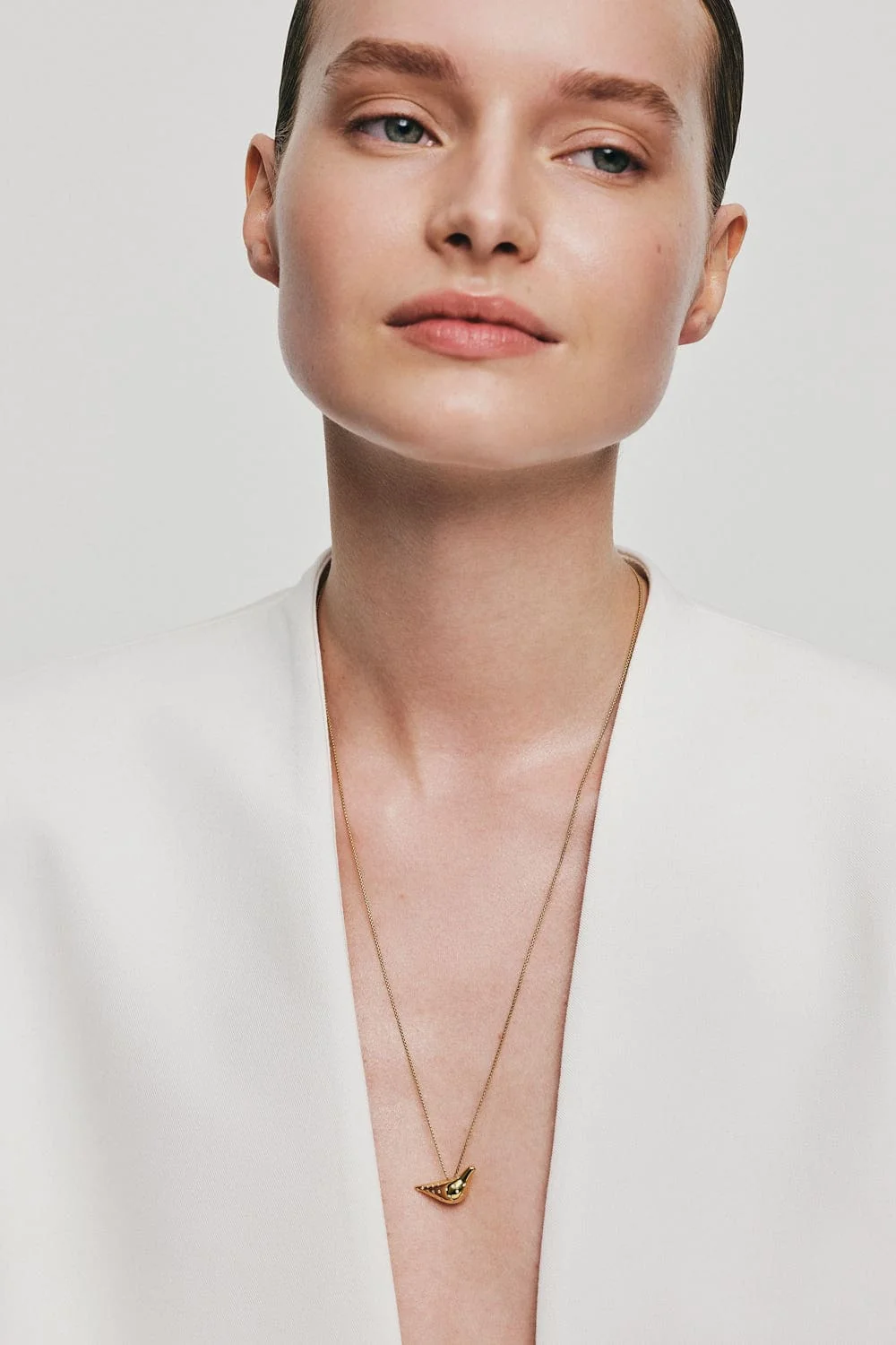 Custom Necklaces Bird Girl Pendant with Diamonds, yellow gold for a luxurious style